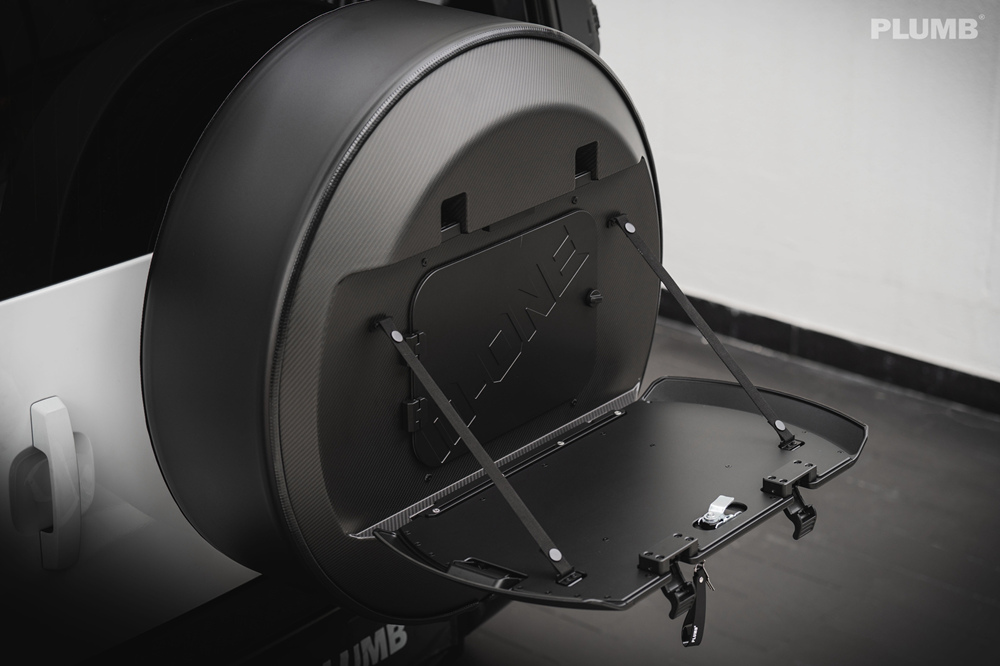 plumb tire cover new defender